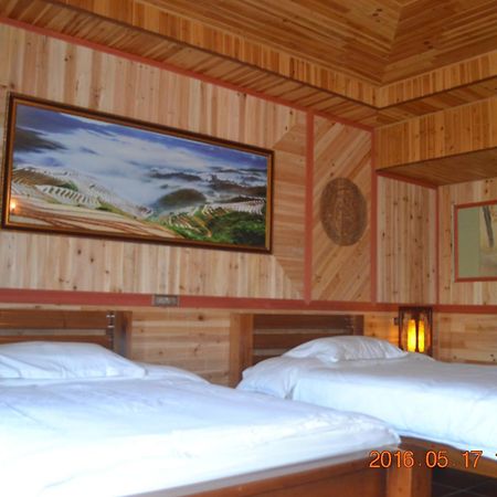 Longji Holiday Hotel Лунгшен Номер фото
