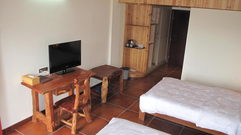 Longji Holiday Hotel Лунгшен Номер фото