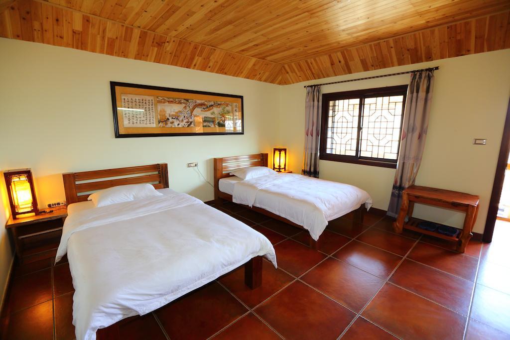 Longji Holiday Hotel Лунгшен Номер фото