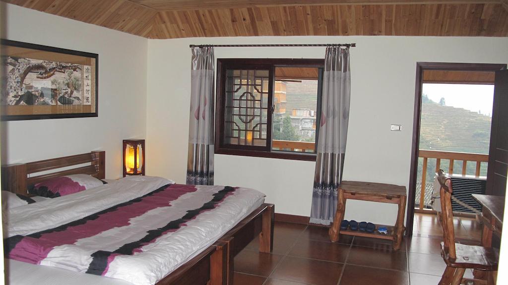 Longji Holiday Hotel Лунгшен Номер фото
