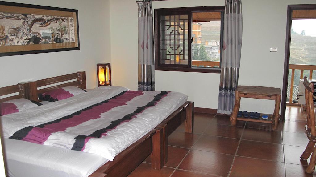 Longji Holiday Hotel Лунгшен Номер фото