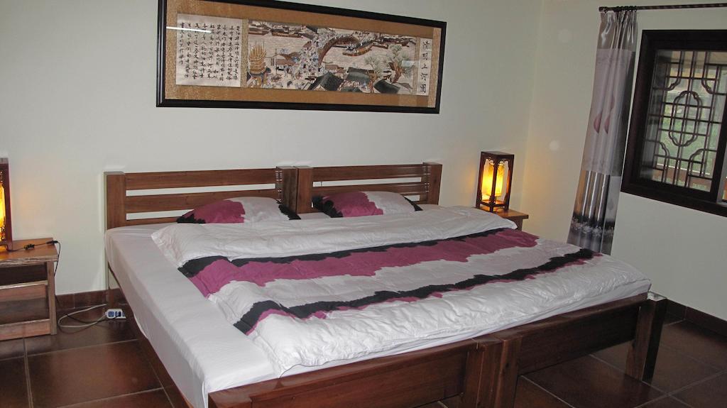Longji Holiday Hotel Лунгшен Номер фото