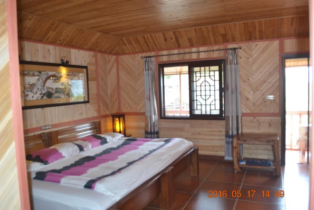 Longji Holiday Hotel Лунгшен Номер фото