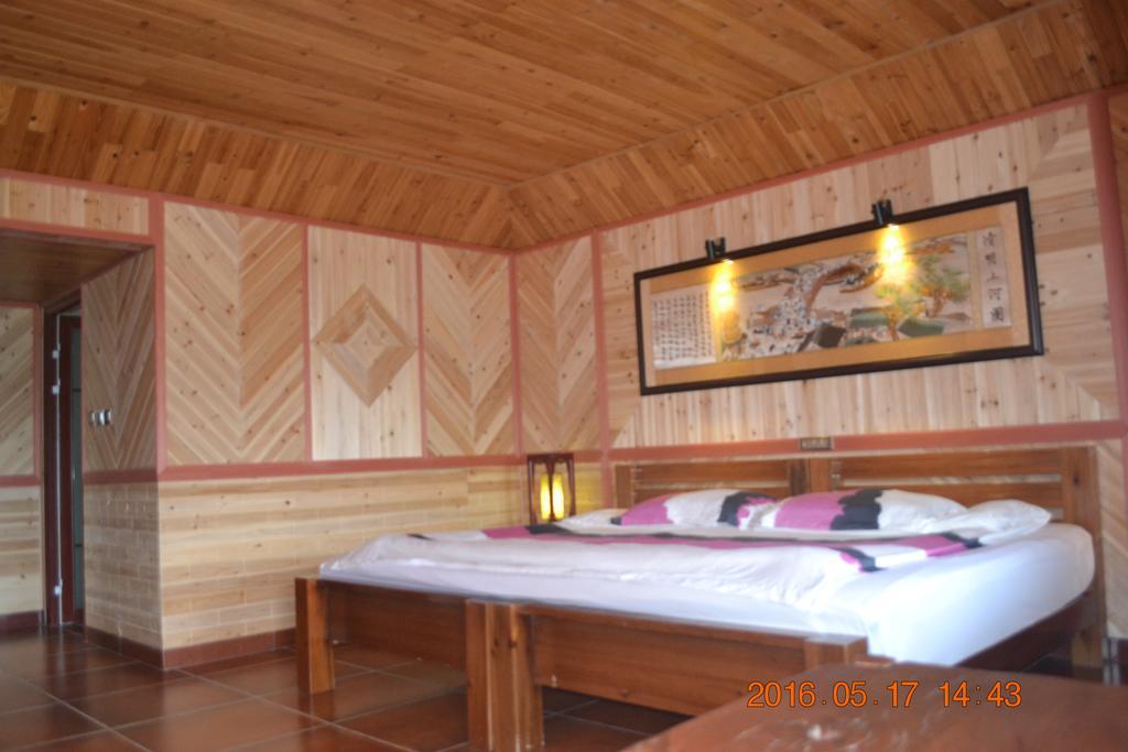 Longji Holiday Hotel Лунгшен Номер фото